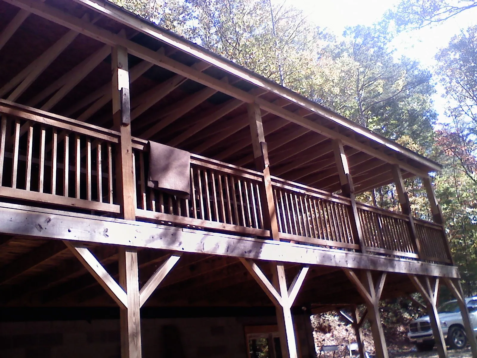 Timber framing under a new elevated porch and deck — Roof Leak Repair in Como by Roofing Brothers